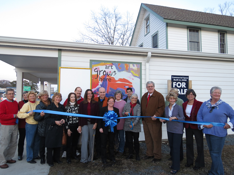 Attending the ribbon cutting for Rehoboth Art League's Annex on the Avenue are (l-r) Gary Hanna, Carole Ellison, Katie Handy, Dale Sheldon, Mary Helms, Judy Rochman, Terry Blackney, Kim Klabe, John Mosher, Sheila Bravo, Chris Price, Rae Ramos, Diane Beebe, Mayor Sam Cooper, Lynne Powell, Carol Everhart, Pat Coluzzi and Becky Carney. SOURCE SUBMITTED